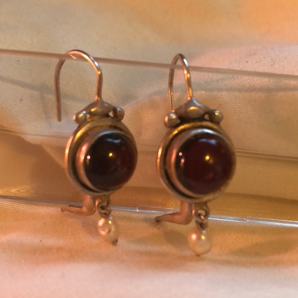 Sterling silver earrings with orange stone
